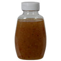 9 oz. Clear PET Clark Oblong Bottle with 38/400 White Ribbed Snap-Top Dispensing Cap with Pressure-Sensitive Liner