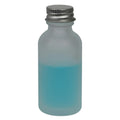 1 oz. Clear Frosted Glass Boston Round Bottle with 20/400 Brushed Silver Aluminum Cap with Foam Liner