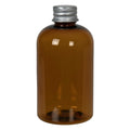 4 oz. Clarified Amber PET Squat Boston Round Bottle with 20/410 Brushed Silver Aluminum Cap with Foam Liner