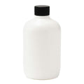 11 oz. White HDPE Stubby Boston Round Bottle with 24/410 Black Ribbed Cap with F217 Liner